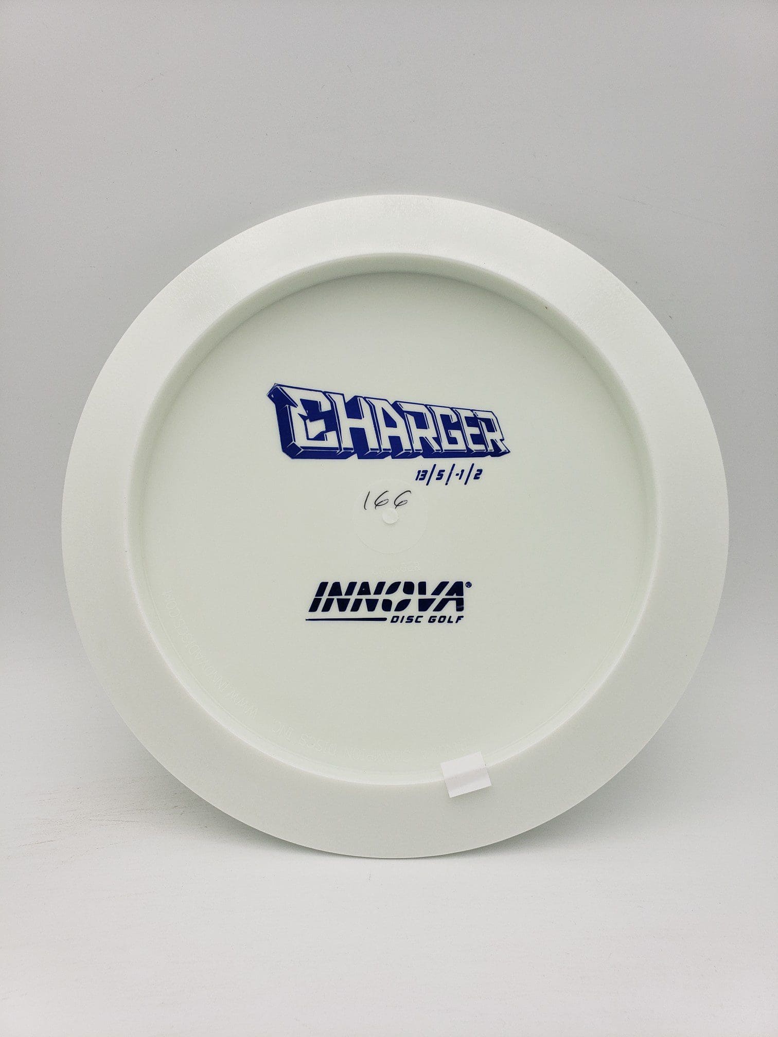 Innova bottom stamped white Star Charger disc golf disc front view