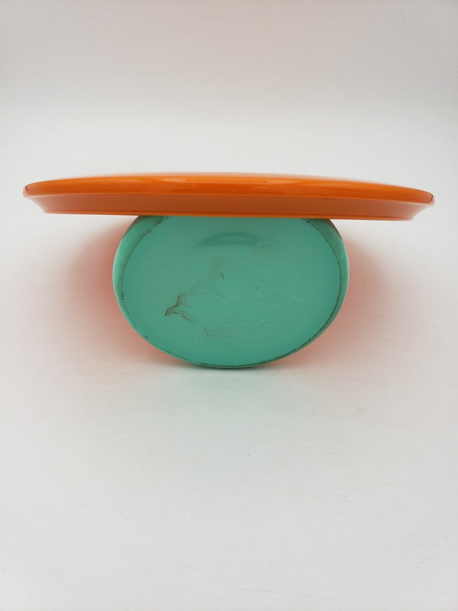 Kastaplast K1 Nord orange disc golf disc back view