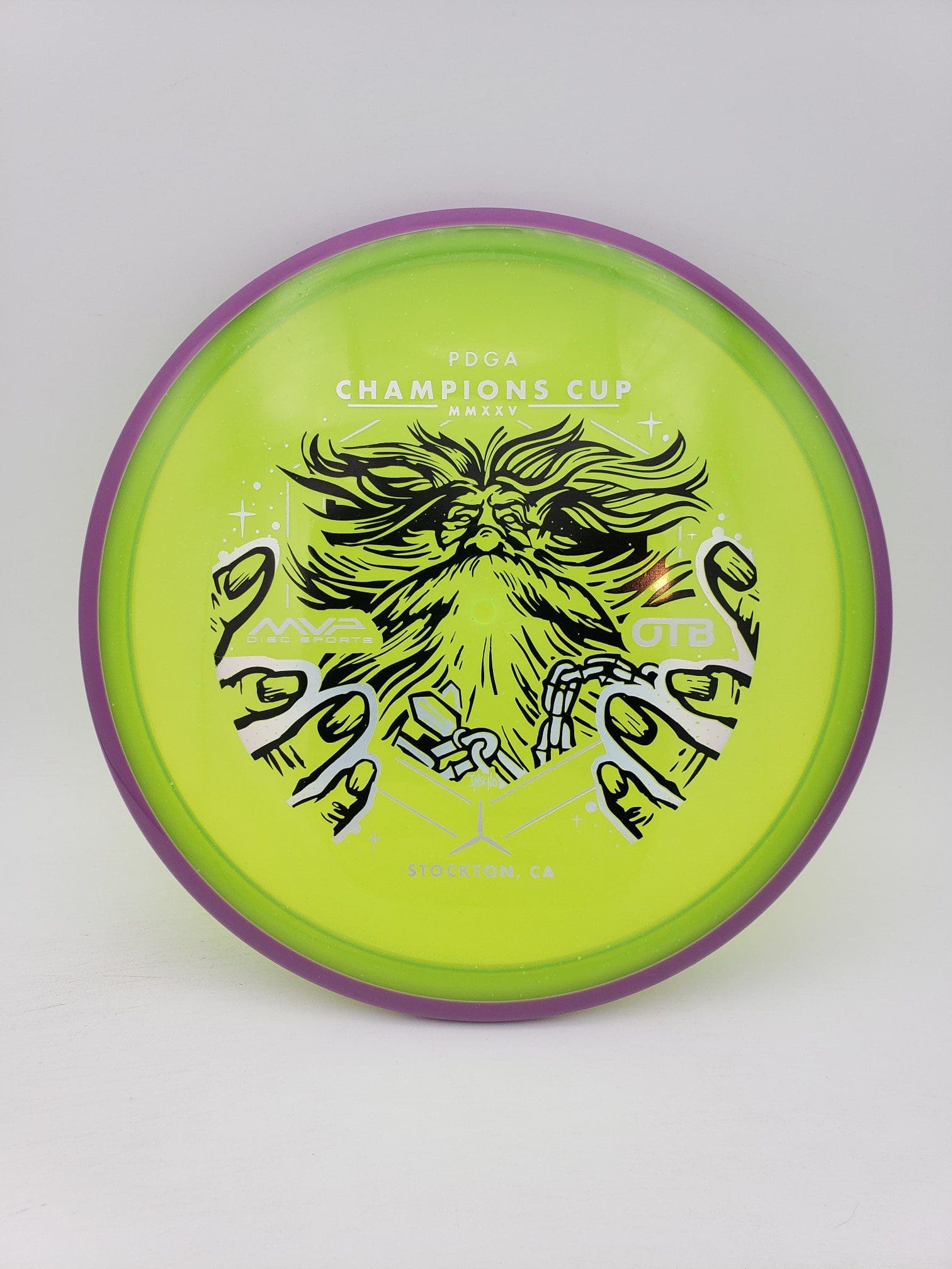 Axiom Particle Glow Proton Hex - Champions Cup Edition disc golf disc front view