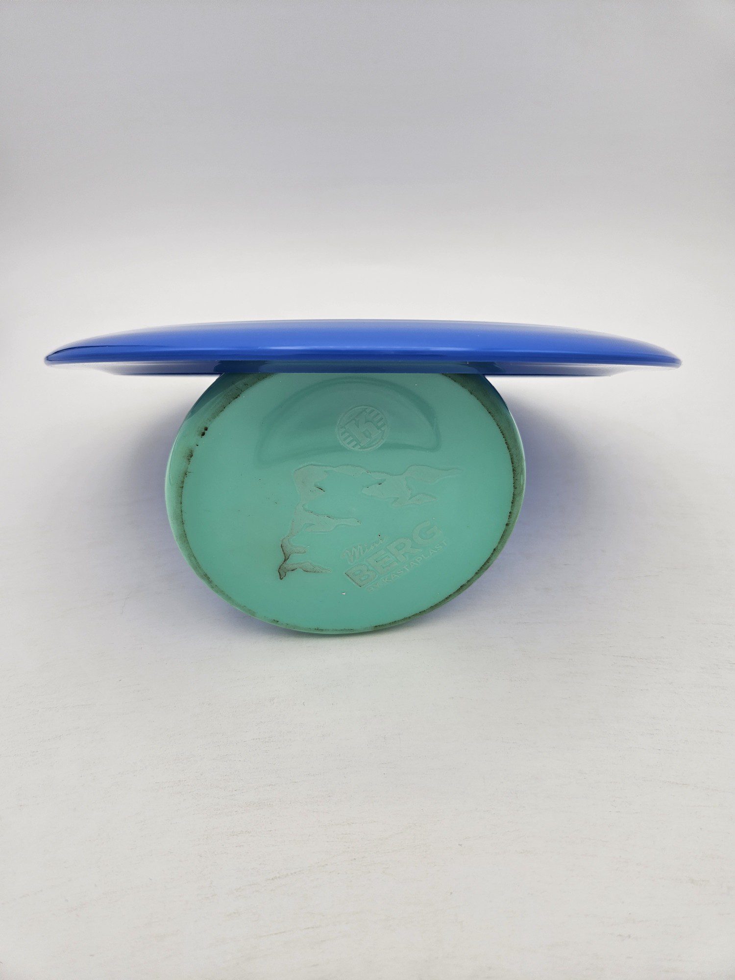 Kastaplast K1 Impa blue disc golf disc back view