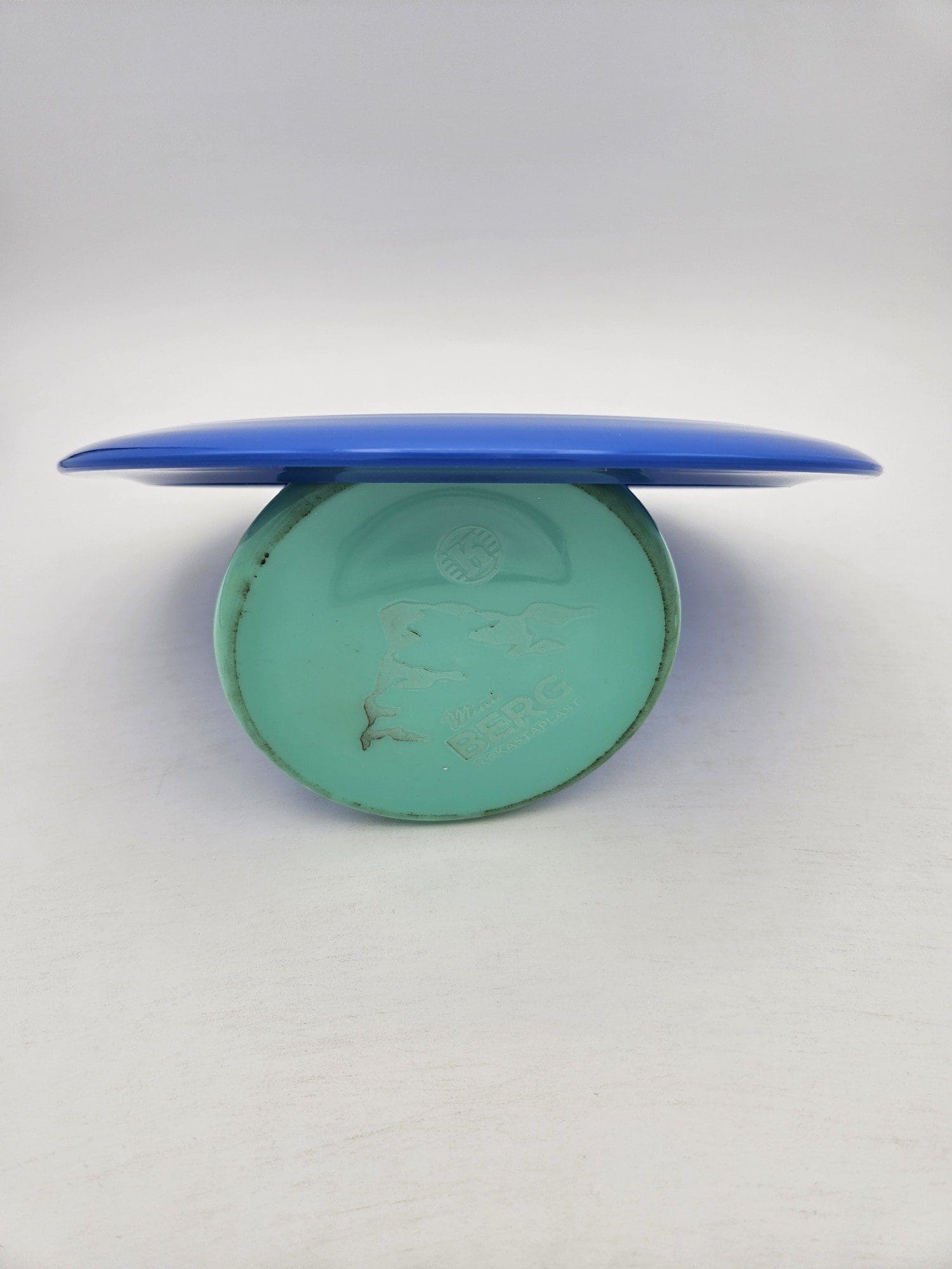 Kastaplast K1 Impa blue disc golf disc back view